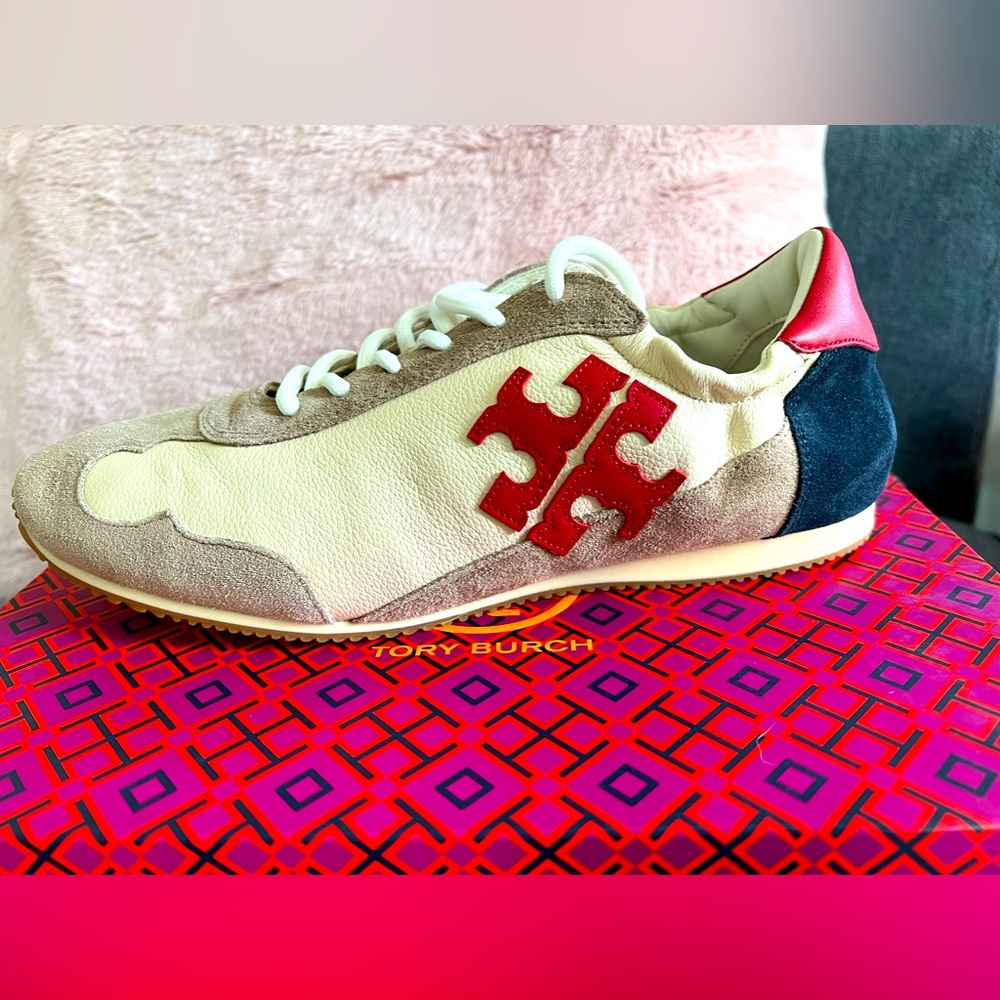 NWT Tory Burch “Tory” sneakers. Never worn and in the box. Size 9.5